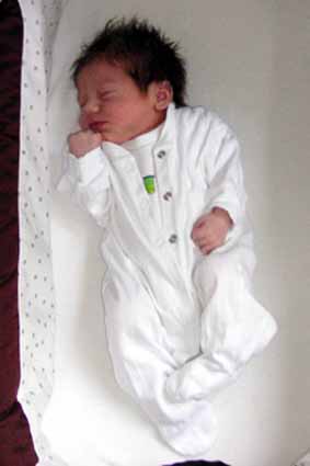 In pram before first public outing.